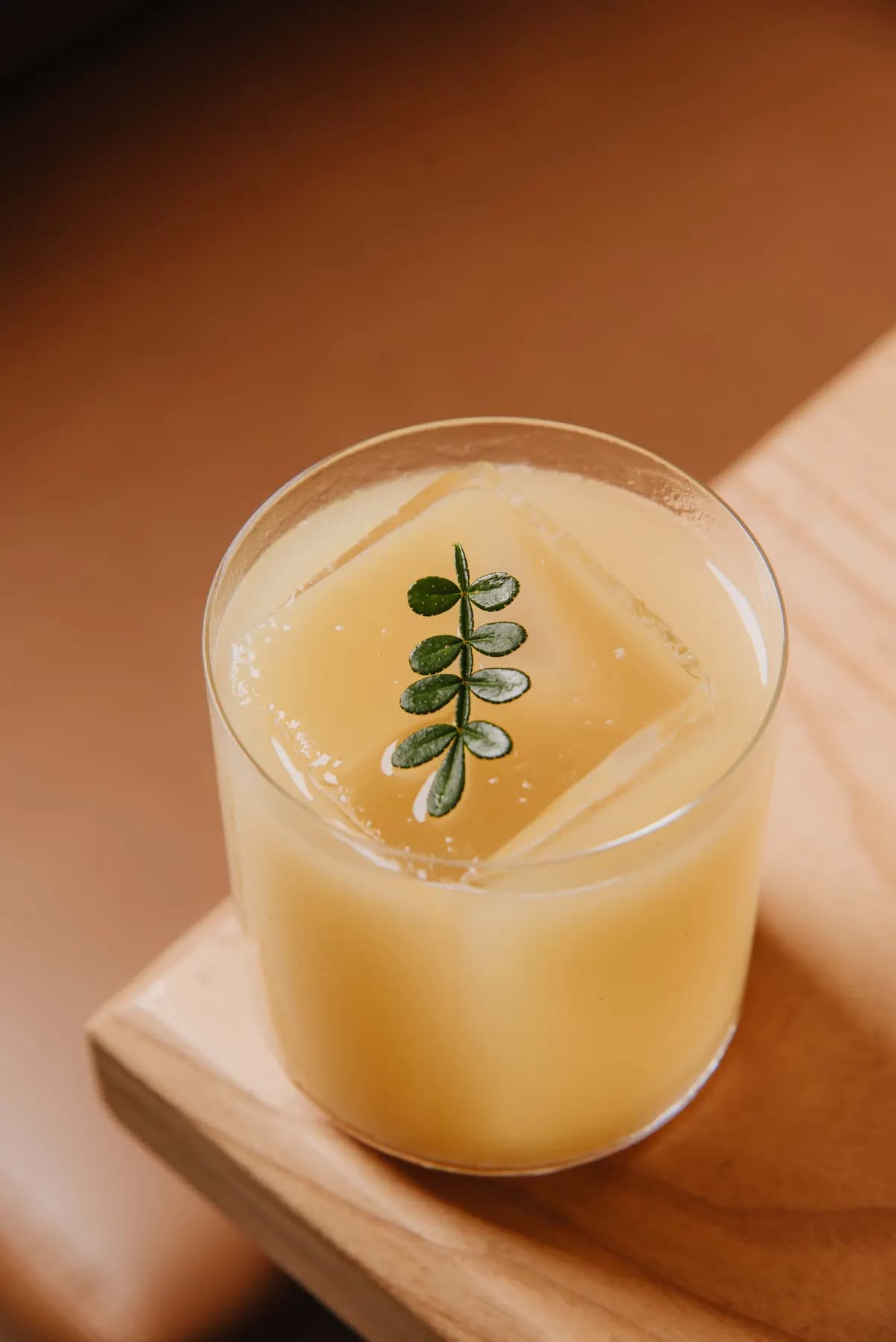 Yuzu cocktail with a decorated ice cube