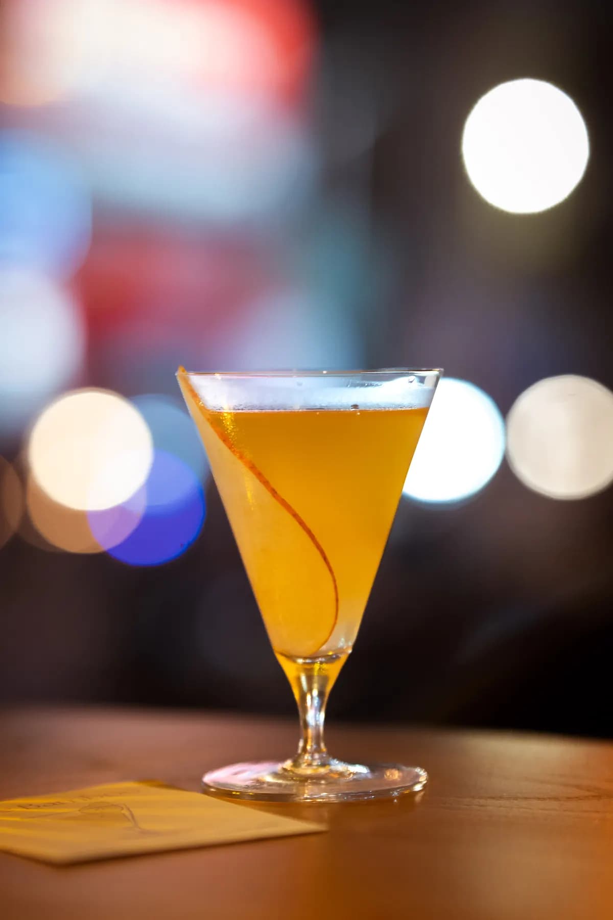 Golden cocktail in a coupe