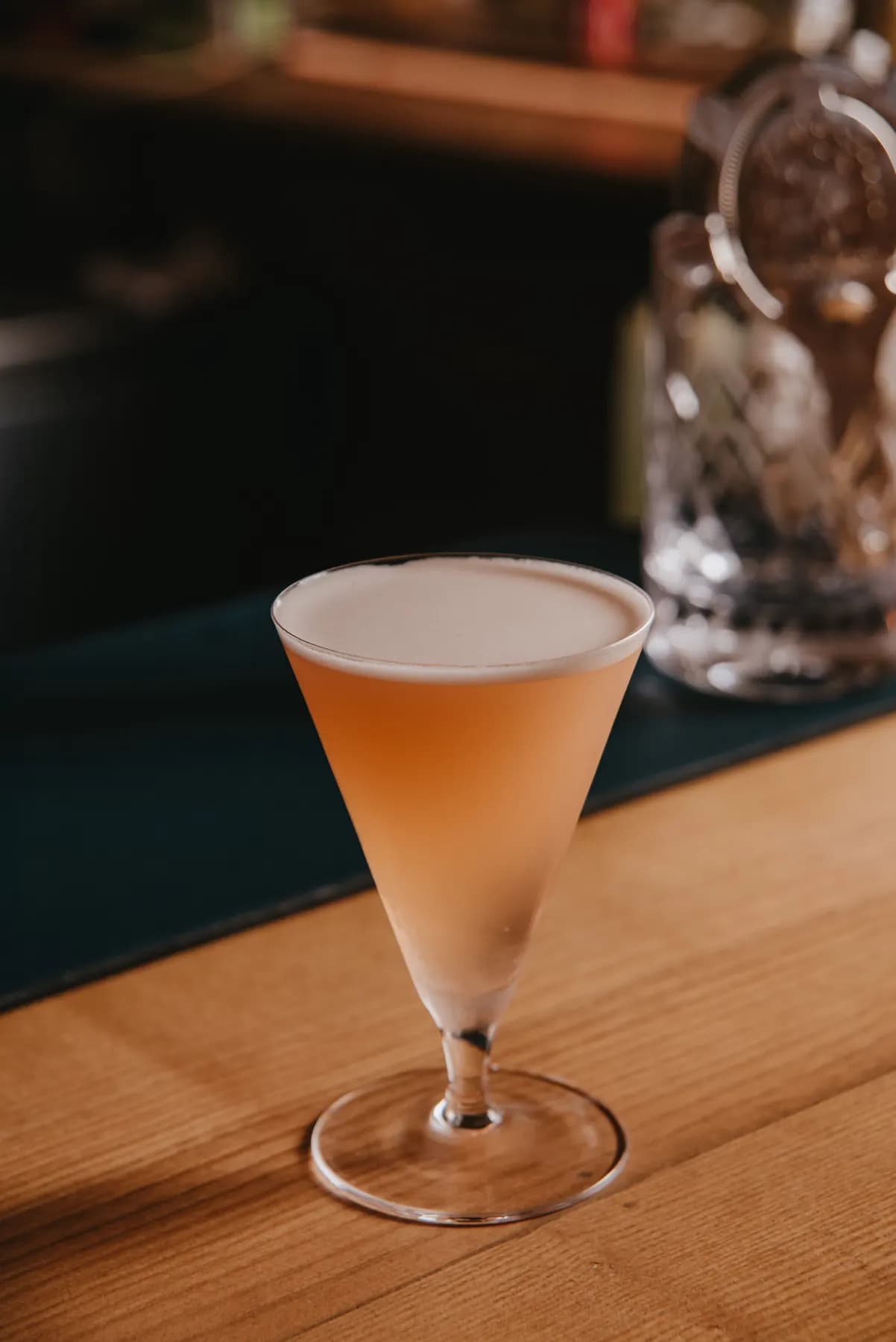 Pink cocktail in a martini glass